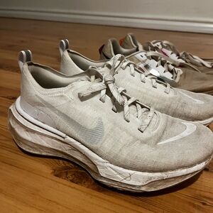 White Nike Invincible Running Shoes